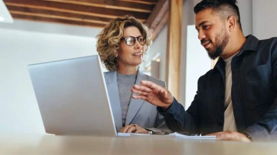 A man talking to the woman